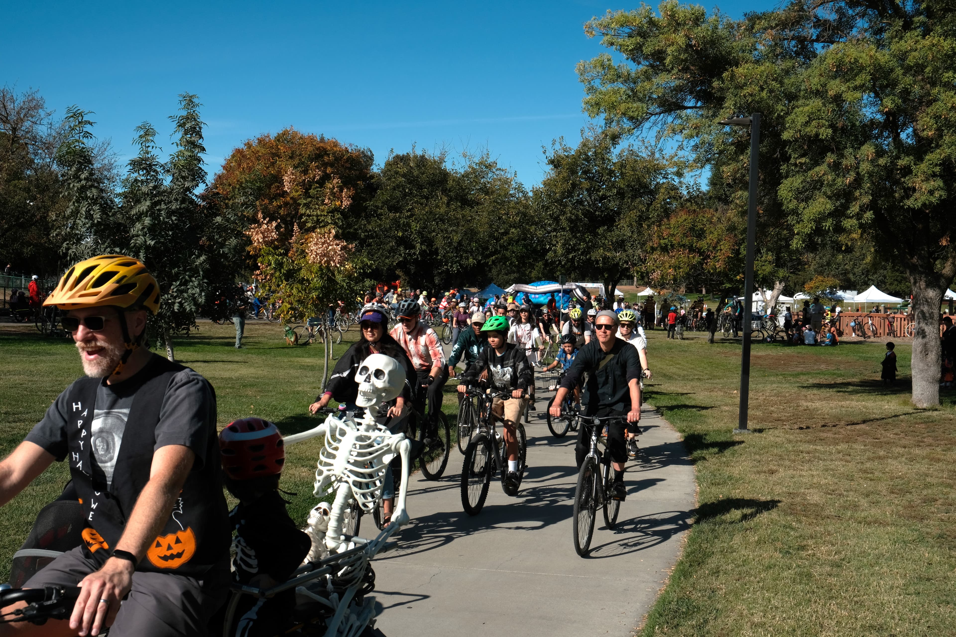 Bikers ride through Community Park as part of the Zombie Bike Parade on Oct. 27, 2024. (Aggie File) 