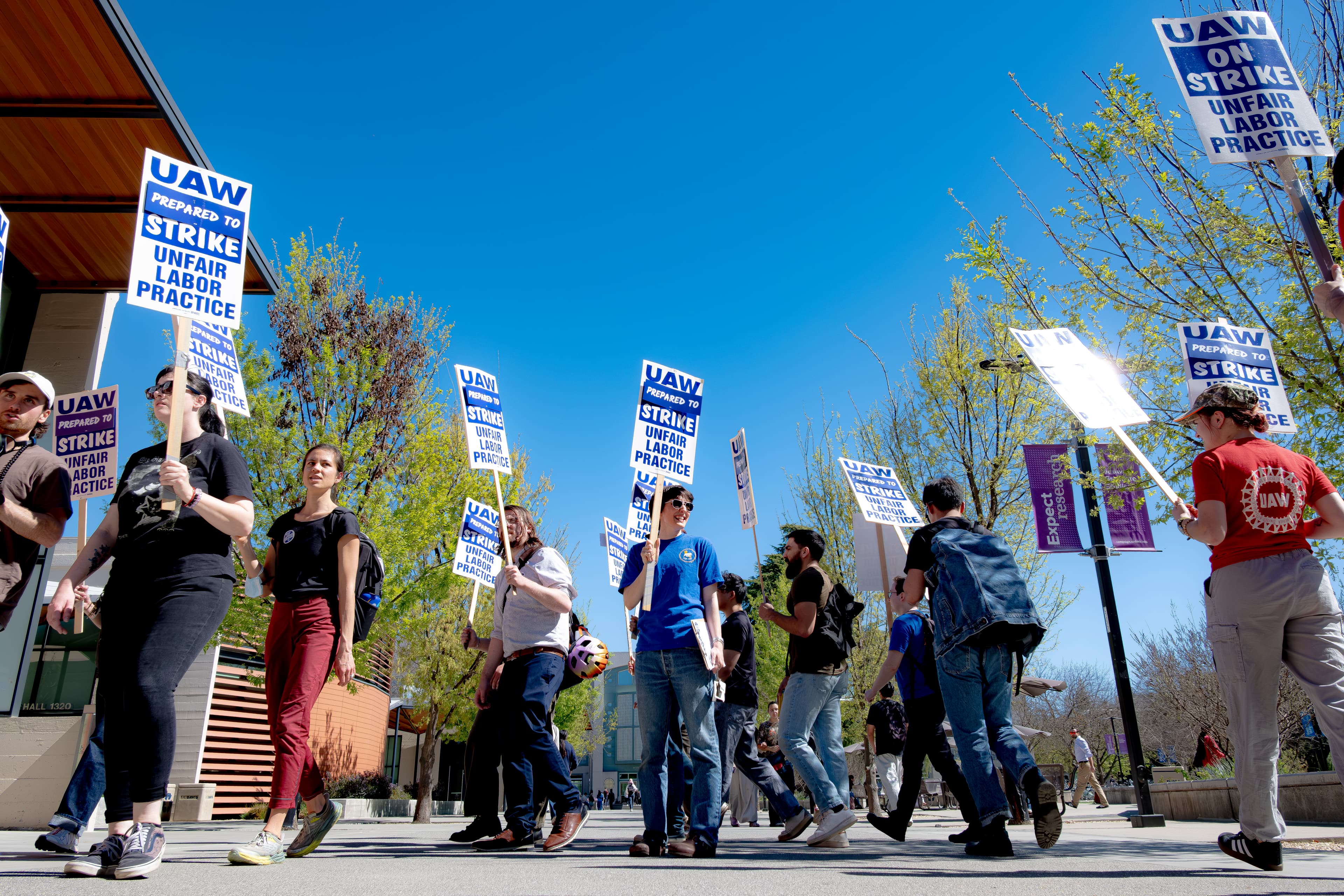 UC Davis workers march through campus on a warning strike in March 2026. (Grant Judkins / Aggie)