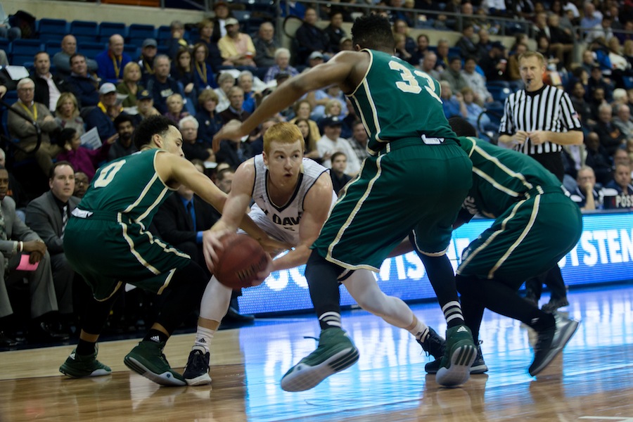 Freshman guard Siler Schneider (#5) slides past the Hornet defense. (KATIE LIN / AGGIE)