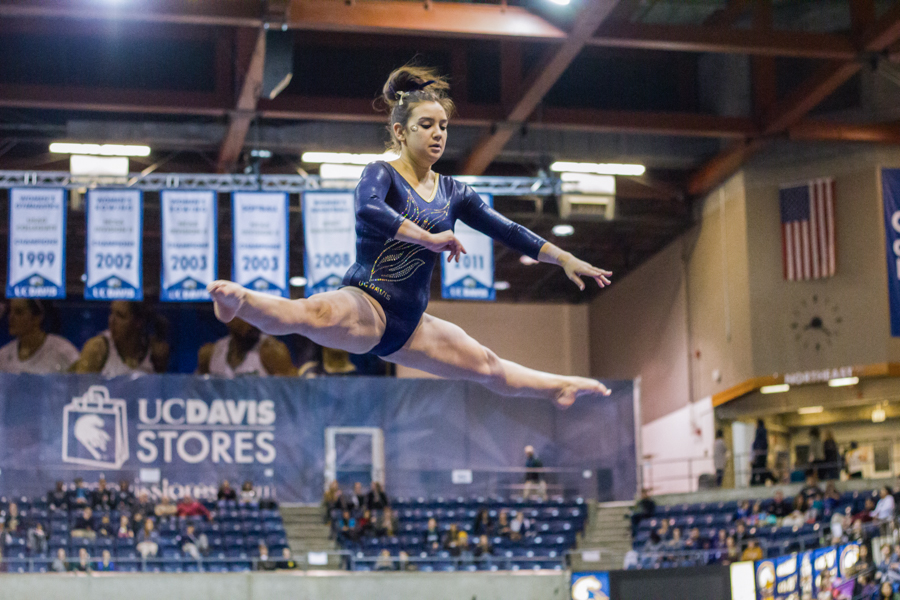 Jamie Yamashita scored a 9.150 on the balance beam on Friday night, contributing to the Aggies' total score of 49.025 in that event. (AARON BURBANK / AGGIE)