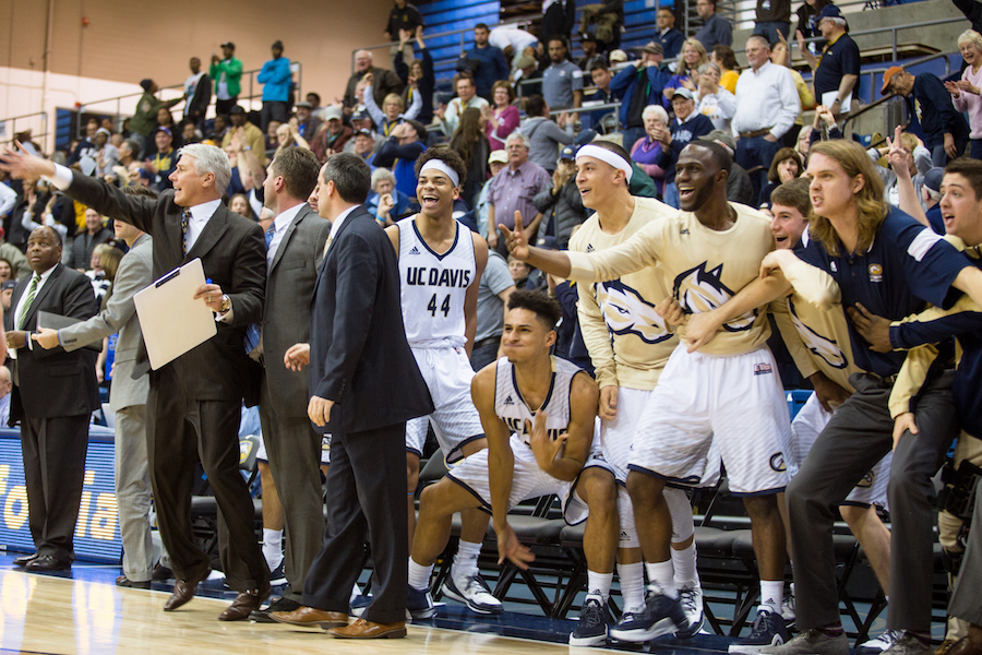 Bench celebrating the win from Silar Schneider's three-point buzzer beater. (KATIE LIN / AGGIE)