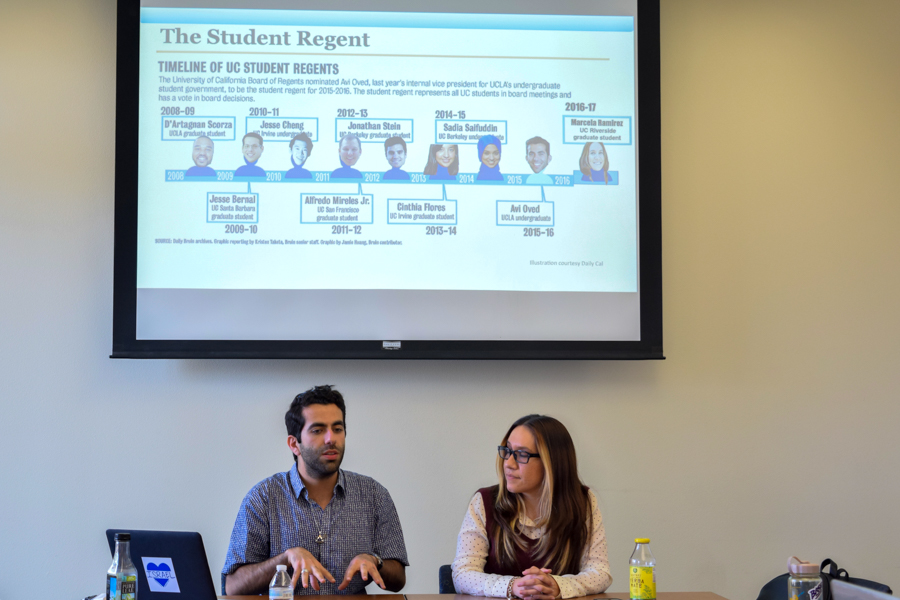 Abraham "Avi" Oved (left) and Marcela Ramirez (right) discuss the position of UC Student Regent in the Student Community Center. (DEBPARNA PRATIHER / AGGIE)