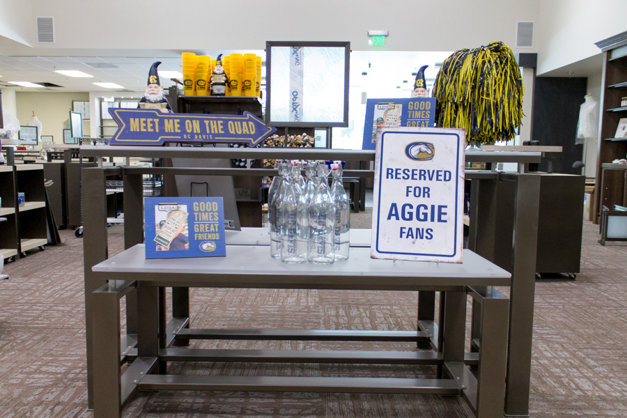 A display featuring new UC Davis items to be sold at the bookstore. (LUCY KNOWLES / AGGIE)