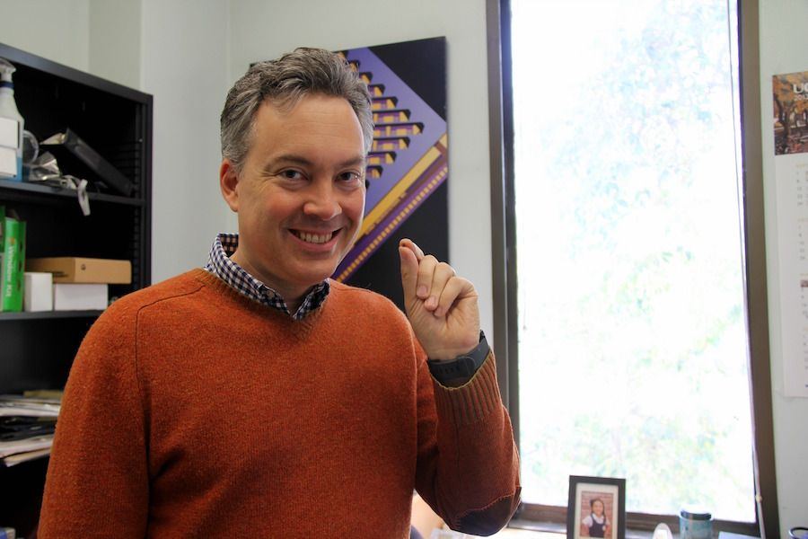 UC Davis Professor David Horsley holds the miniscule sensor chip used for motion recognition. (MONICA CHAN / AGGIE)