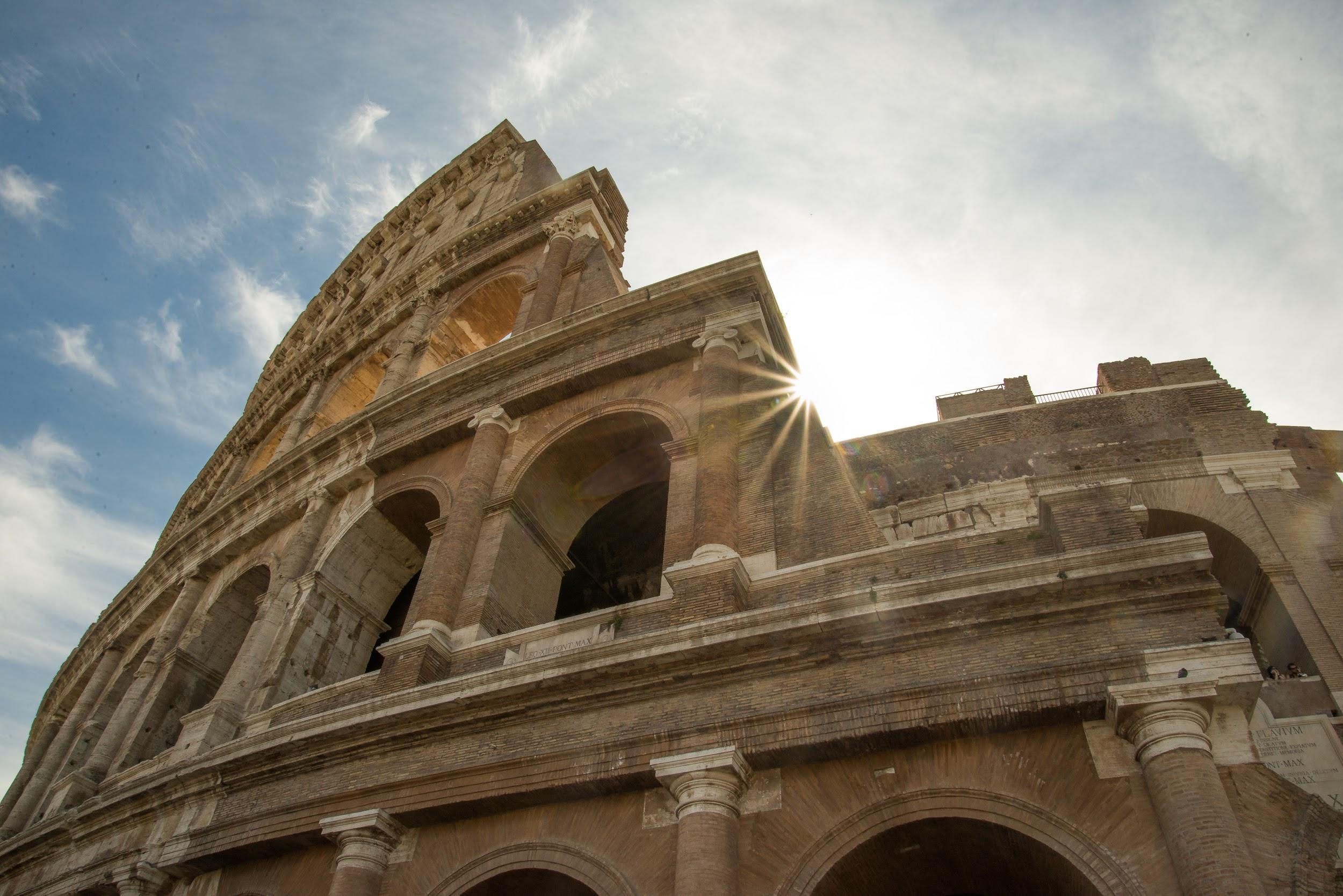 Thousands of years ago, gladiators entered these arches in hopes of gaining fame and fortune. Now, tourists enter for a glimpse into the past and a quick stop at the souvenir shop. (Rome, Italy) (ANH-TRAM BUI)