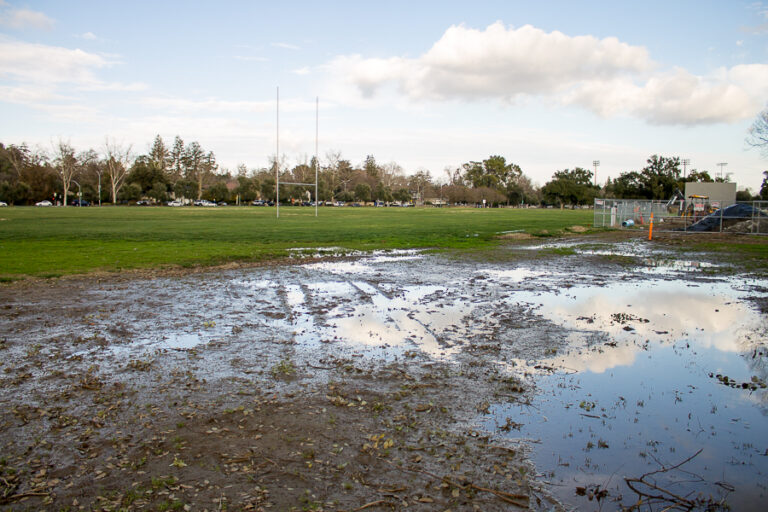 Humor: Draining the swamp — administration promises to clear out Russell Field after rains