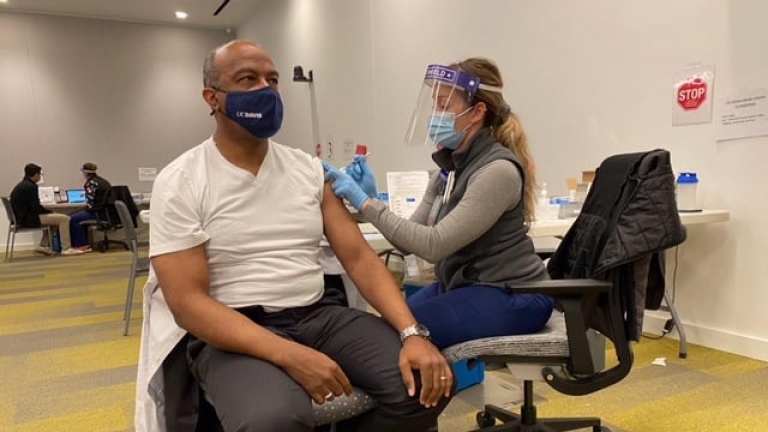 UC Davis Chancellor Gary May receives vaccination, encourages people of color to trust vaccine