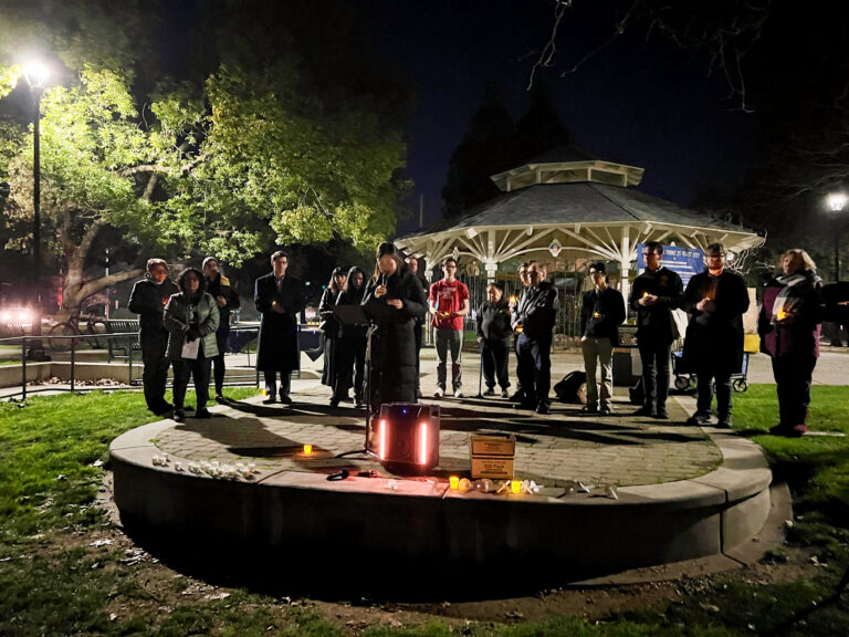 Students, Davis leaders hold candlelight vigil downtown after multiple mass shootings in California